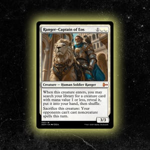May include: A white Magic: The Gathering card featuring "Ranger-Captain of Eos." The artwork depicts a human soldier riding a lion, with a bird on his shoulder. The card text describes its abilities and stats, with a 3/3 power and toughness.