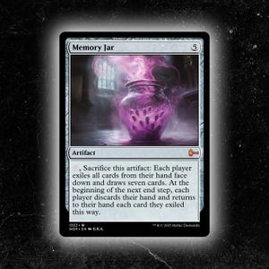 May include: A Magic: The Gathering card titled "Memory Jar." The card features a purple jar with ghostly hands inside, set against a smoky background. The card is labeled as an artifact with a mana cost of 5.