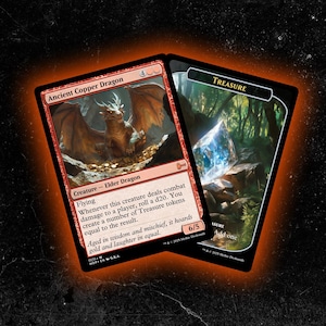 May include: Two Magic: The Gathering cards. One card features an illustration of a red dragon with gold coins, labeled "Ancient Copper Dragon." The other card is labeled "Treasure" and depicts a gem in a forest setting. The cards have a red and black border.