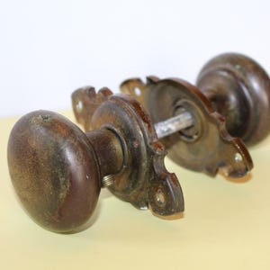 Vintage Set of Two Brass Door Knobs Hardware Set Rounded Brown Antique Hardware with Knobs, Stems and Plates