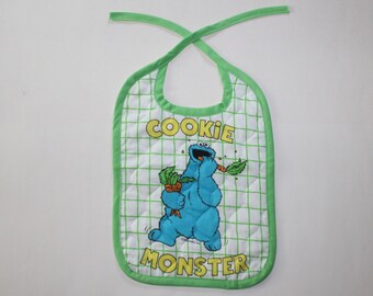 on sale Vintage Cookie Monster Baby Bib Muppets Inc. 1980s