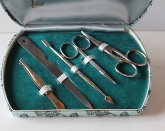 on SALE Vintage 5 Piece Manicure Set By LaCross with Teal and Black Floral Case Made in USA