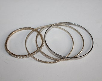 Vintage Bracelet Lot of One Rhinestone Stretch Bracelet and Three Silver Bangle Bracelets