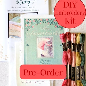 May include: A DIY embroidery kit featuring a guide titled Stitch Your Story, a printed fabric panel of The Secret Garden by Frances Hodgson, and five skeins of embroidery floss in shades of red, pink, peach, yellow, and green. Text includes DIY Embroidery Kit and Pre-Order.