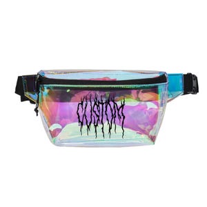 May include: A bum bag made of iridescent, semi-transparent material that shifts in colour. It features a black zip closure, a black adjustable strap with a plastic buckle, and the word CUSTOM printed in a jagged, black, gothic-style font.