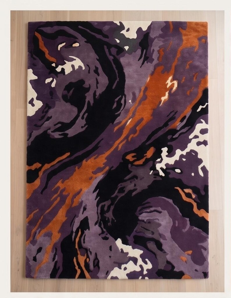 May include: A rectangular area rug featuring an abstract, swirling pattern in shades of deep purple, light lavender, burnt orange, black, and cream. The design consists of fluid, organic shapes that flow across the surface in a dynamic composition.