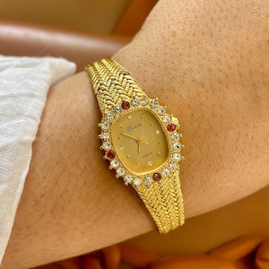 Rare Vintage 1970s Quartz Movement Gold Plated Bracelet Strap Cubic Zircon Set Gemstone Oval Dial Ladies Dress Wristwatch by Orchide