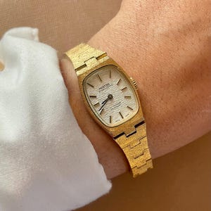Vintage 1970s Swiss Movement 17 Jewels Incabloc Gold Plated Ladies Silver Dial Mechanical Cocktail Dress Watch by Montine Of Switzerland
