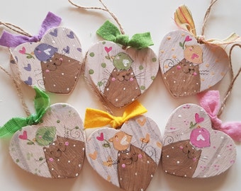 wooden heart decorations to hang with hand-painted Easter cats and chicks