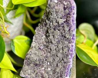 Amethyst Cutbase with Grey sugar coating. From Brazil.  2.5 pounds. 6” tall