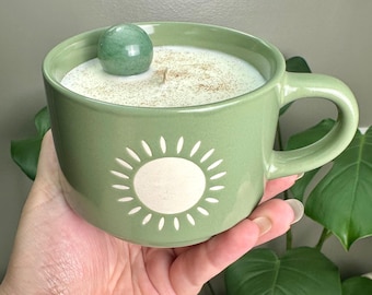9oz Sun Kissed scented candle in reusable Sun design mug. Green Aventurine Crystal sphere. 45 hours burn time. Cotton wick, soy wax