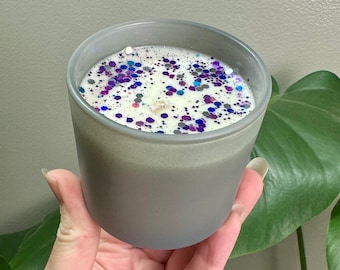 4oz Stogie & Flask scented hand poured soy candle in frosted grey jar with fitted wood lid. 20 hours burn time. Masculine scent