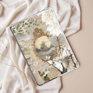 May include: A clear tablet case with a collage design. It features butterflies, flowers, and a castle scene. The design uses vintage elements in beige, cream, and gold tones, creating a romantic aesthetic.