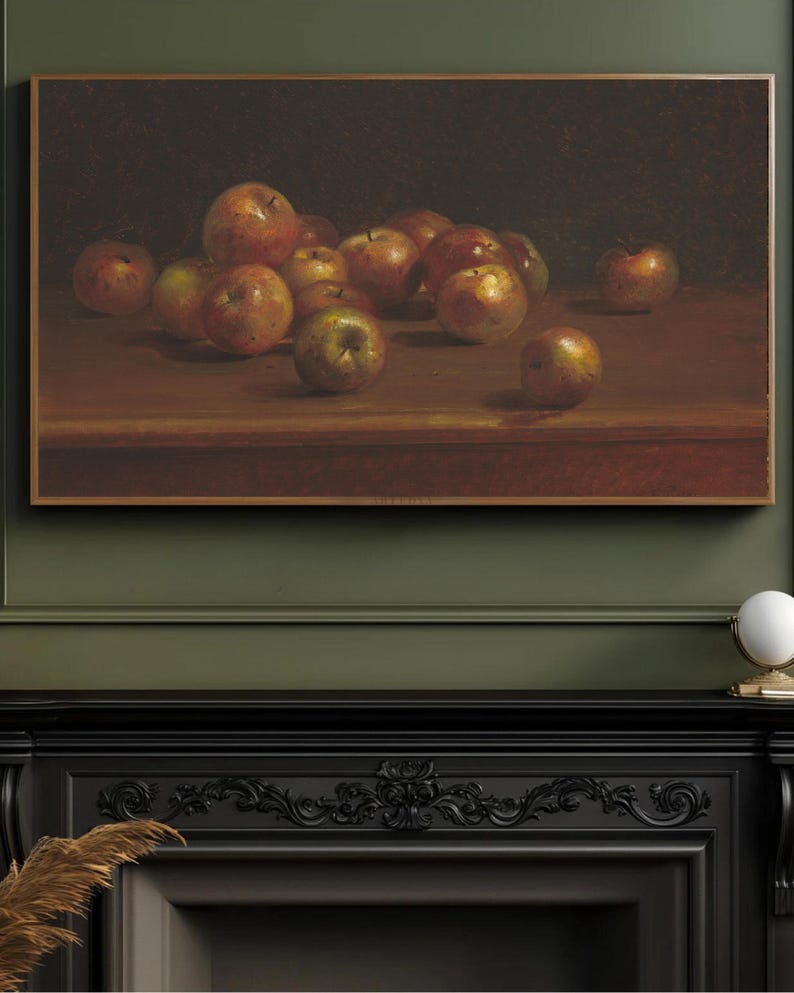 May include: A still life painting of a bowl of apples on a wooden table. The apples are various shades of red and green, and some are slightly bruised. The painting is framed in a gold frame.