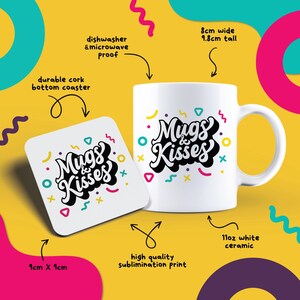 two coffee mugs sitting next to each other