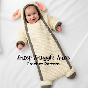 May include: A cream-colored baby sleep sack with a sheep design. The sack has a hood with pink and cream-colored ears, gray trim, and gray buttons down the front. The text "Sheep Snuggle Sack Crochet Pattern" is displayed.