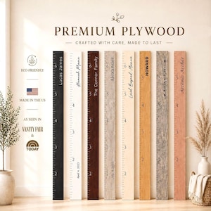 May include: Eight vertical wooden growth charts in various finishes, including black, white, dark brown, light wood, and grey. Each board features printed imperial measurements from 2 to 6 feet and personalized names or dates engraved on the surface.