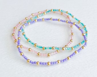 dainty mothers day gift set, delicate gold bead layering bracelets, personalized gift for mom, spring pastel pink teal lavender jewelry