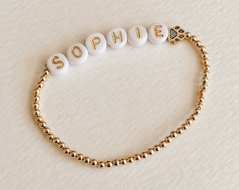 personalized jewelry, dog mom gold paw print bracelet, mother's day gift for pet lovers, dainty gold name jewelry, beaded stretchy bracelet