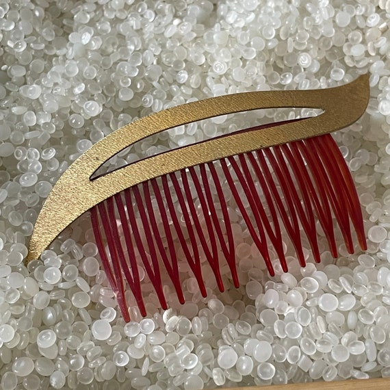 vintage hair comb, etched muted gold tone,plastic 
