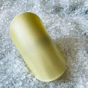 vintage barrette, ponytail holder, plastic, retro hair ,moon glow , glossy finish, ponytail clasp. hair cuff, simplistic,  yellow