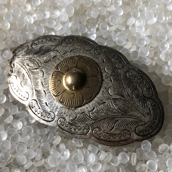 vintage barrette . western silver, concho , carv