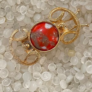 vintage barrette gold tone metal  very art Nouveau style  orange cabochon