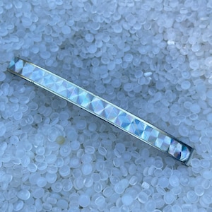 vintage barrettes , slender metal barrette , holographic center strip , pale gold tone  vintage Goody,