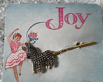 Vintage barrette, gold tone Donkey, booby pin clasp , still on store card,,