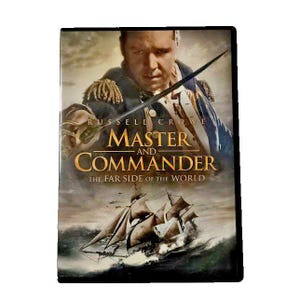 May include: DVD case for the movie "Master and Commander: The Far Side of the World." The cover features Russell Crowe, a ship at sea, and the film's title in gold lettering against a dark background.