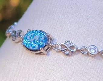 Infinity Cremation Ashes Bracelet with Infused Glass in Sterling Silver CZ Chain
