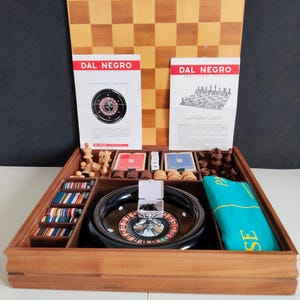 Vintage original Dal Negro game book from the 1960s in a wooden case.