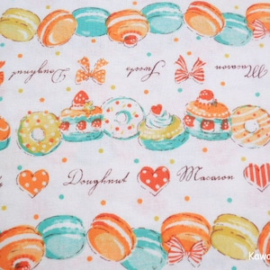 Japanskt tyg - Sötsaker Macarons Donuts Orange - Halv meter (ma161201)