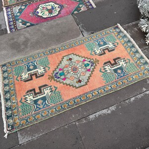 Vintage Turkish Wool Rug: Small Anatolian Doormat (1.9 x 3.6 ft)