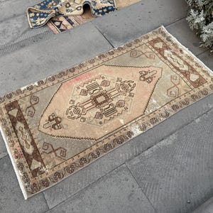 Vintage Turkish Wool Rug: Small Anatolian Doormat (1.9 x 3.7 ft)