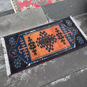 Vintage Turkish Wool Rug: Small Anatolian Doormat (1.5 x 2.9 ft)
