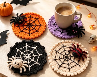 May include: Four round crochet coasters featuring spider web patterns in orange, purple, black, and beige. Each coaster includes a small, attached plush spider. The orange coaster has a black spider, the purple has a black spider, the black has a white spider, and the beige has a red and black striped spider.