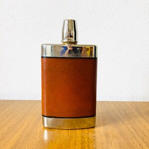 Fiaschetta vintage tedesca avvolta in pelle