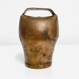 Vintage, Swiss made, carved cow bell, in excellent vintage condition