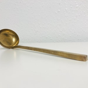 Rare find solid brass ladle with a square shaped handle, in good vintage condition