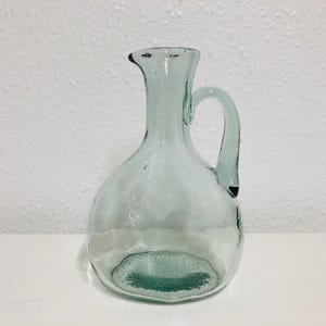 Hand made vintage heavy glass jug / pitcher with green tint