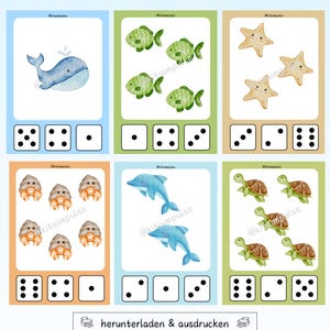 May include: Educational flashcards featuring watercolor illustrations of marine animals, including a whale, fish, starfish, hermit crabs, dolphins, and turtles. Each card displays a different number of objects and dice for counting practice. The cards are in various colors.