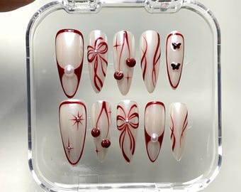 Handgemaakte parel chroom pers op de nagels - rode valentijnsstrik, lange amandel