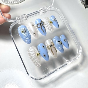 Blue Sea Press On Nails: Medium Almond Seashell Design