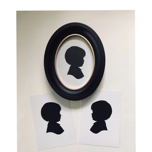 FRAMED 5x7” Silhouette, Custom Hand Cut Portrait, Single Subject in Classic Disney Black Oval PLASTIC Frame, with Two Additional FREE Copies