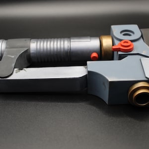 Ezra Bridgers Lightsaber Blaster from Star Wars Rebels image 1