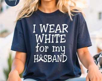 Camiseta unisex "Visto de blanco por mi marido" con el lema "Cáncer de pulmón", camiseta de concienciación sobre el cáncer de pulmón, superviviente de cáncer de pulmón, lazo blanco contra el cáncer