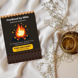 May include: A flyer for FireWood by Mike, featuring a cartoon campfire illustration with flames. The text reads "Quality wood, ready to burn!" and "Dry, seasoned firewood." A yellow banner states "FREE DELIVERY" with a phone number.