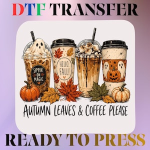 May include: A DTF transfer design featuring four coffee cups decorated with autumn themes, including pumpkins, fall leaves, and ghosts. The text reads "Sippin' on magic", "Hello, fall!", and "Autumn leaves & coffee please". The design is ready to press.