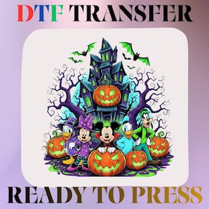 May include: A DTF transfer ready to press featuring a colorful Halloween illustration of cartoon characters in front of a haunted house with glowing orange jack-o'-lanterns, bare purple trees, and green bats against a dark night sky.
